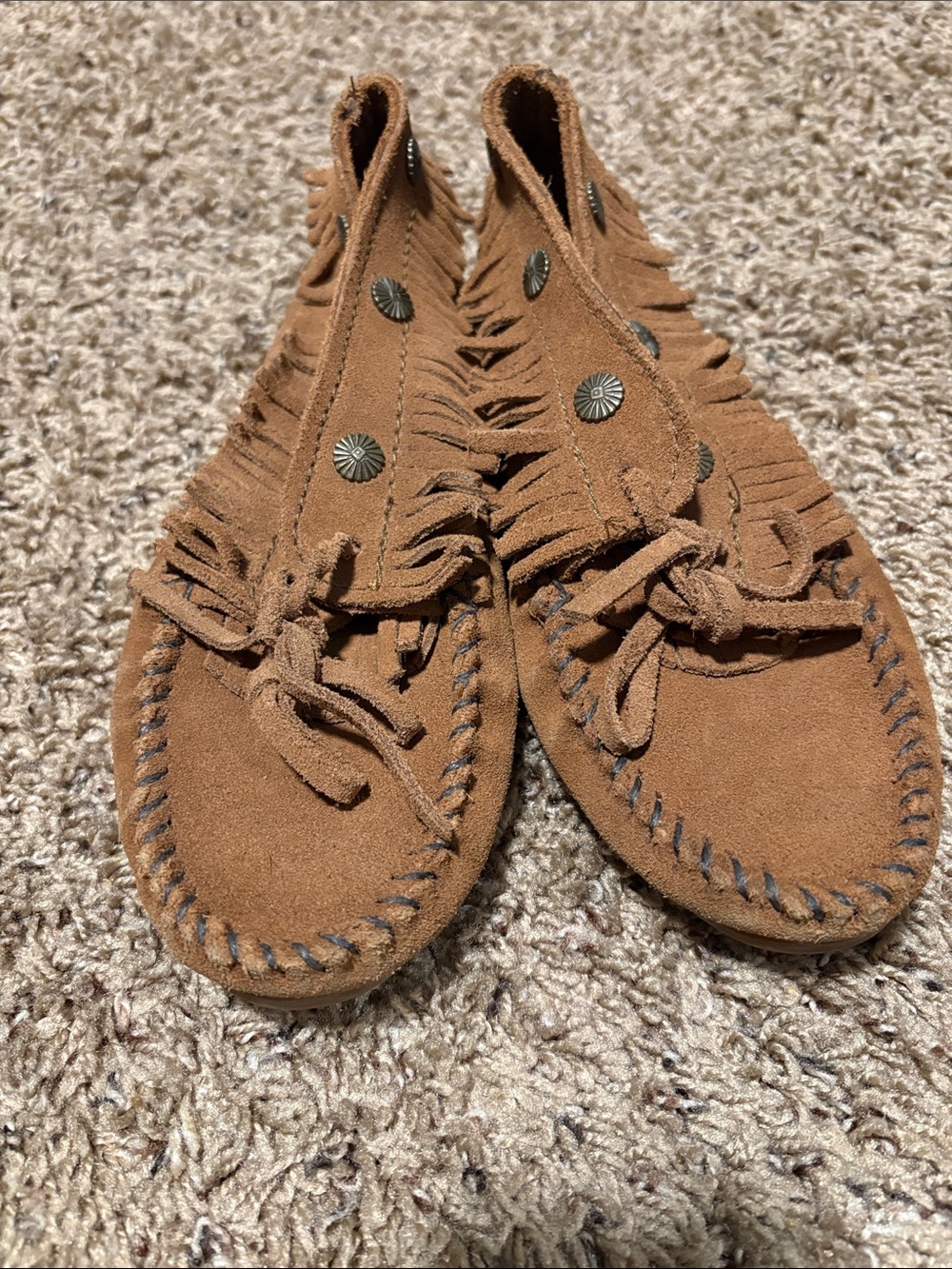 Minnetonka Tan Suede Fringe Moccasins with Concho Studs